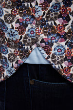 White with Black, Purple, Orange, Magenta, Blue and Navy Flowers Short Sleeve Jersey Knit