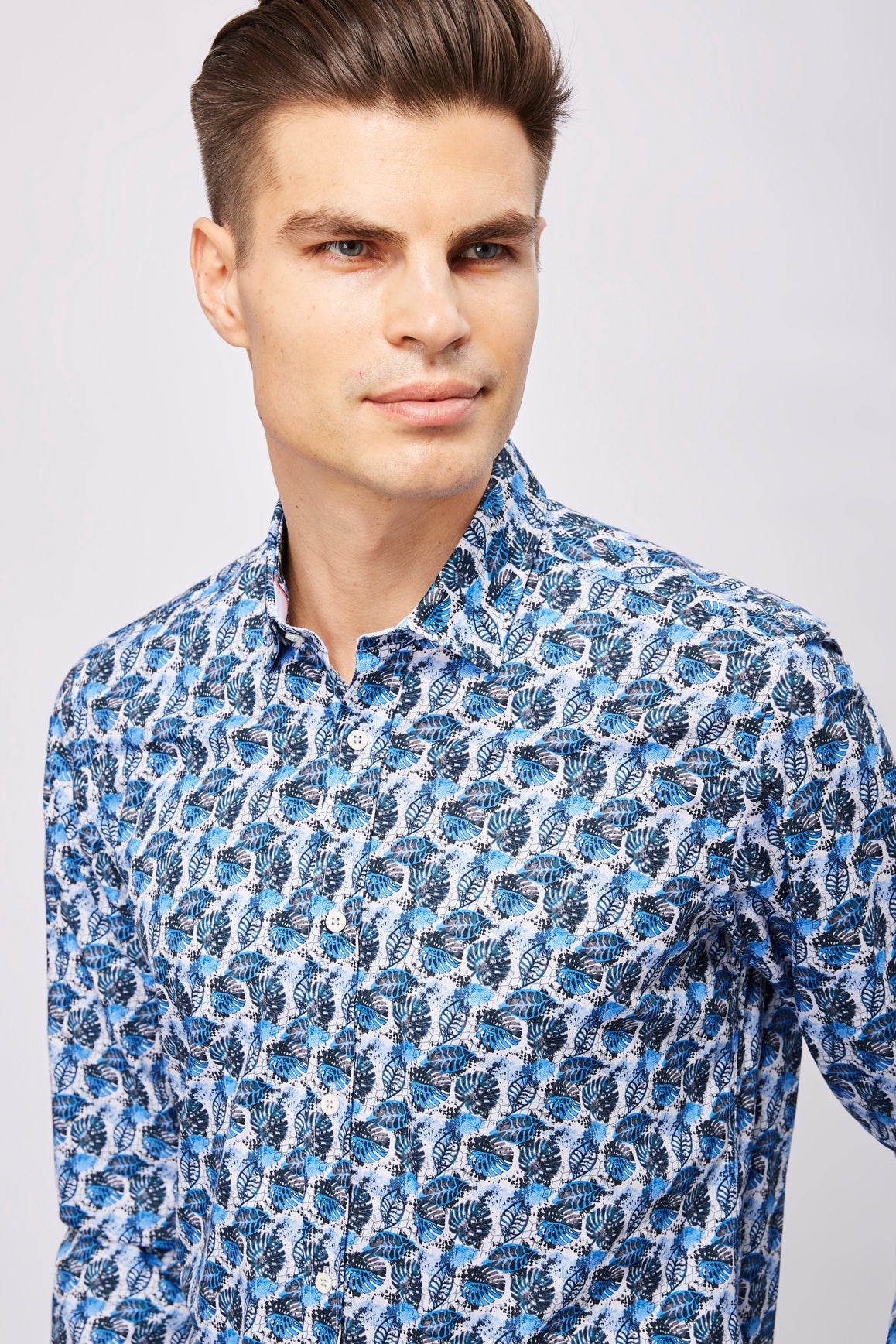 Leo White with Multi Blue Leaves Shirt